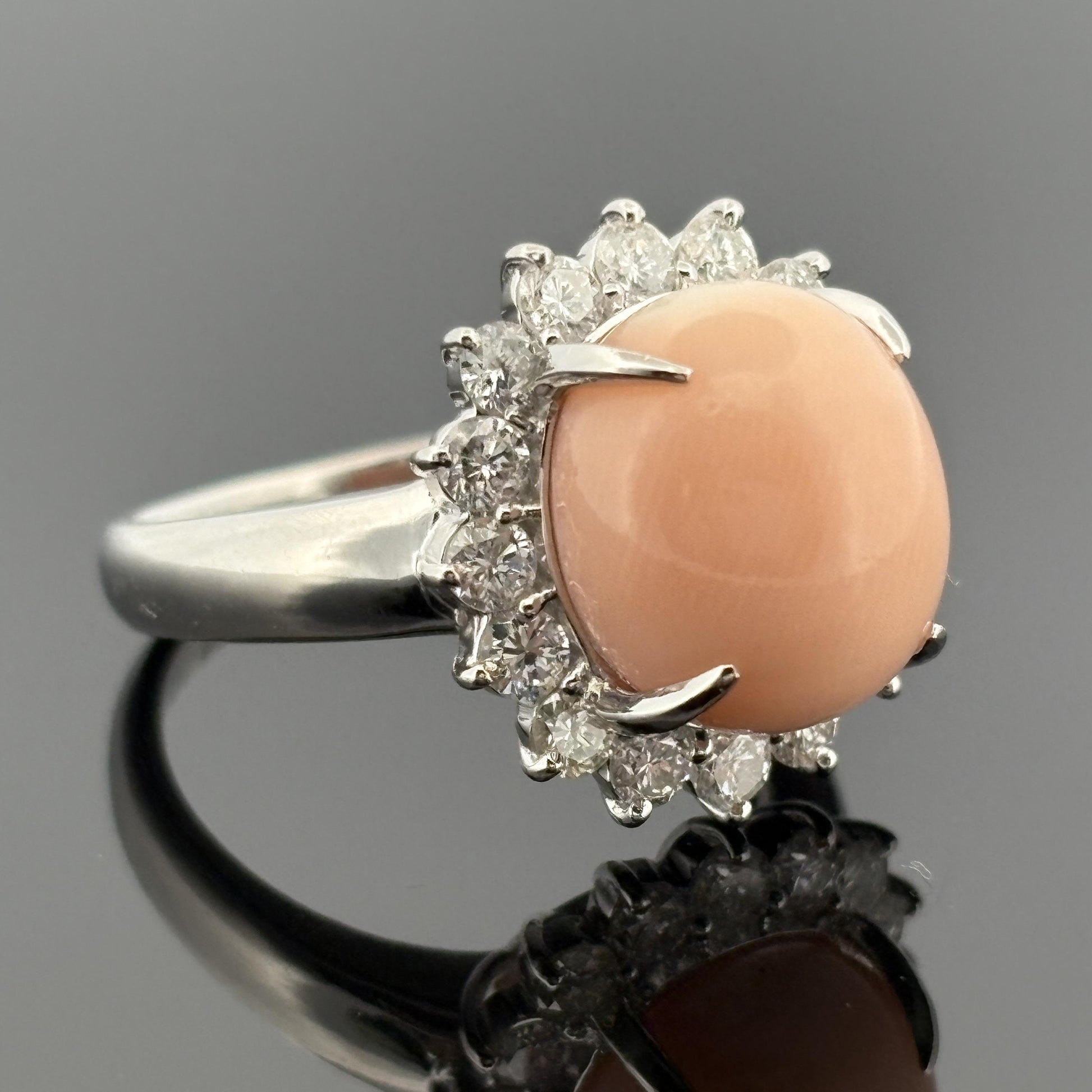 Estate Coral & Halo Diamond Platinum Ring