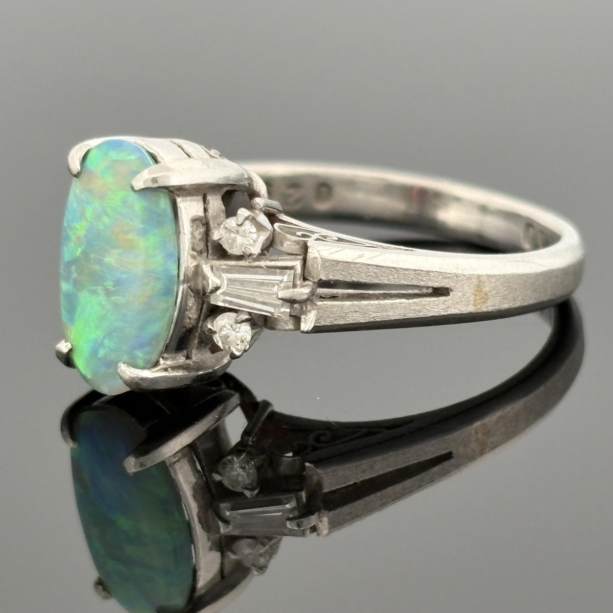 1.10ct Black Opal and 0.25ctw Diamond Platinum Ring
