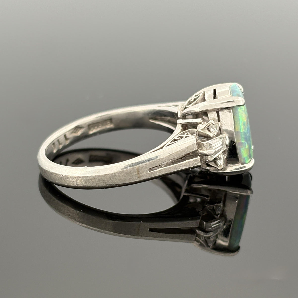 1.10ct Black Opal and 0.25ctw Diamond Platinum Ring