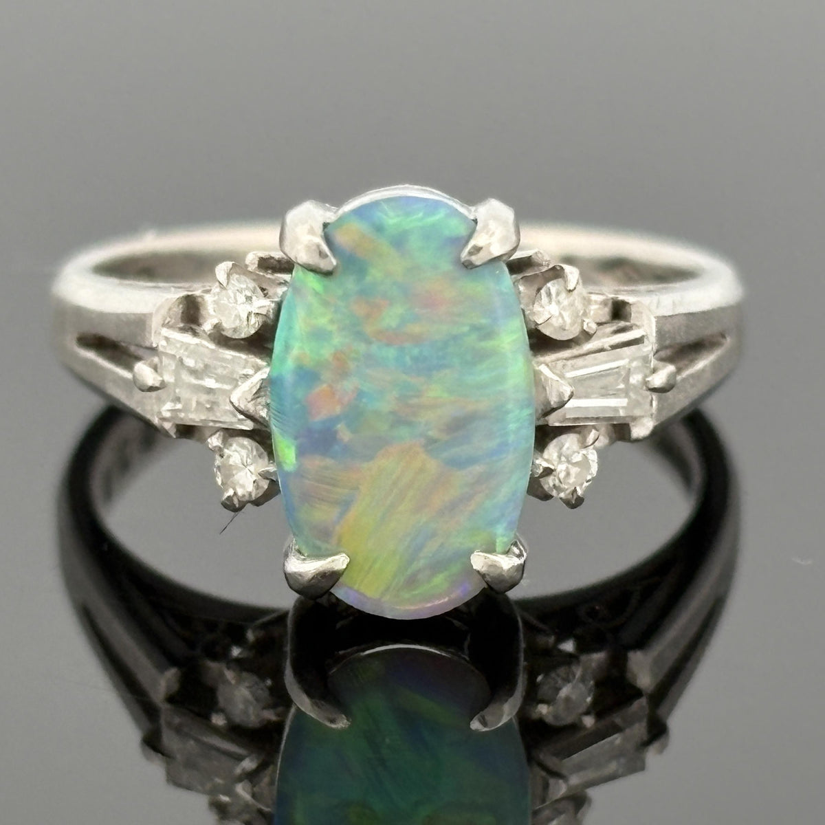 1.10ct Black Opal and 0.25ctw Diamond Platinum Ring